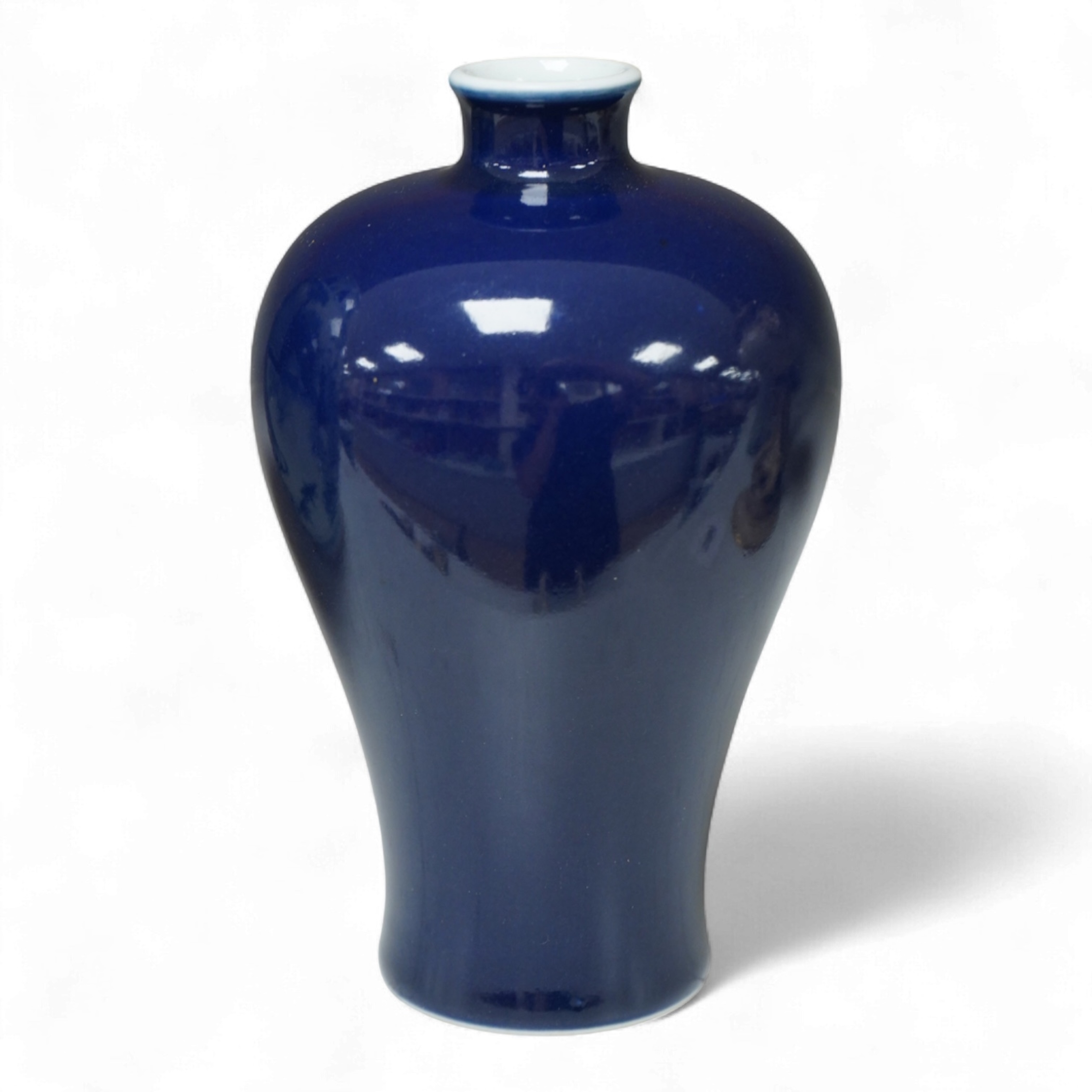 A Chinese blue monochrome meiping, Kangxi mark but later, 17cm